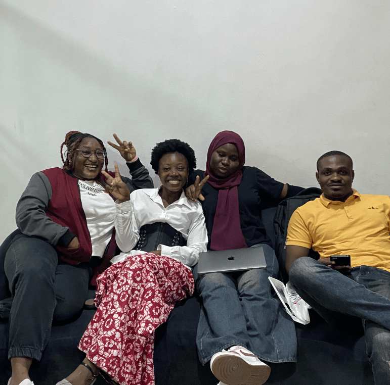 Optimus AI Labs team members in a relaxed group photo